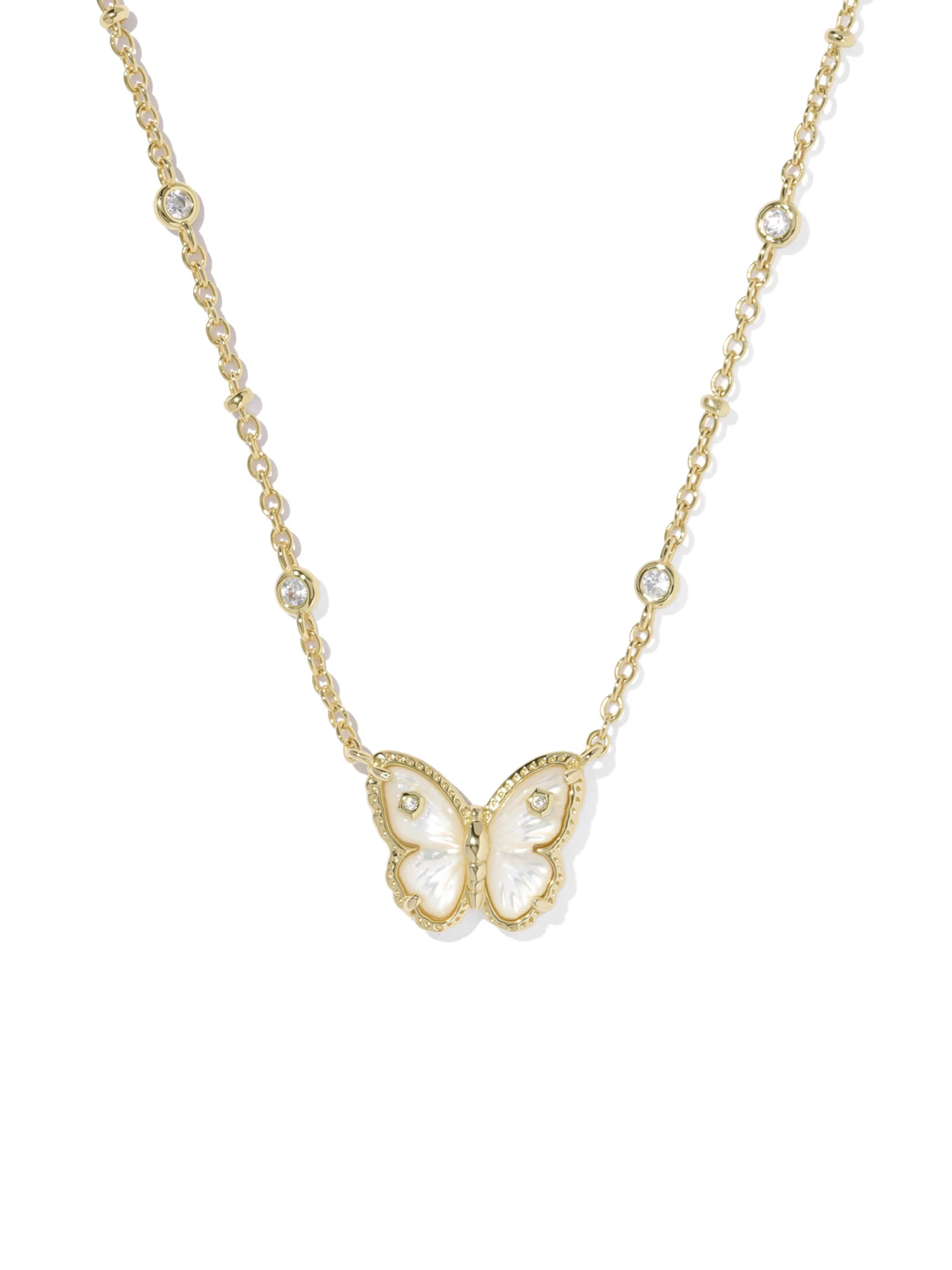 Gold butterfly necklace on a white background