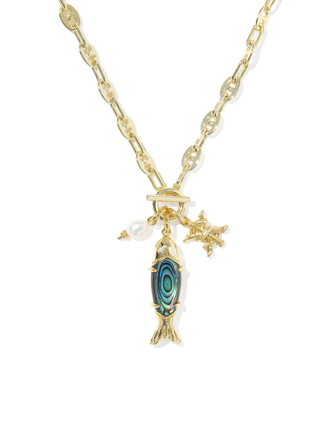 A gold-tone chain necklace featuring a fish-shaped abalone shell pendant with a blue-green iridescent pattern, a small white pearl charm, and a starfish charm, shown on a plain white background.