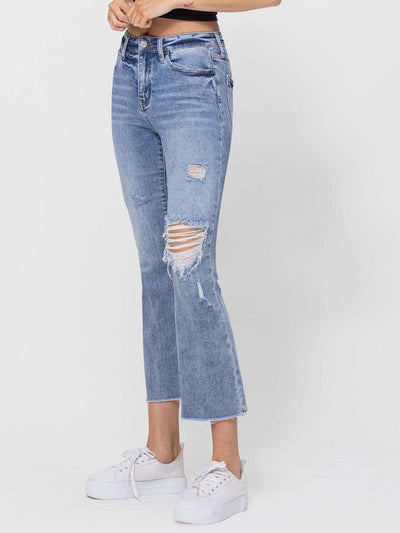 distressed medium wash flare denim