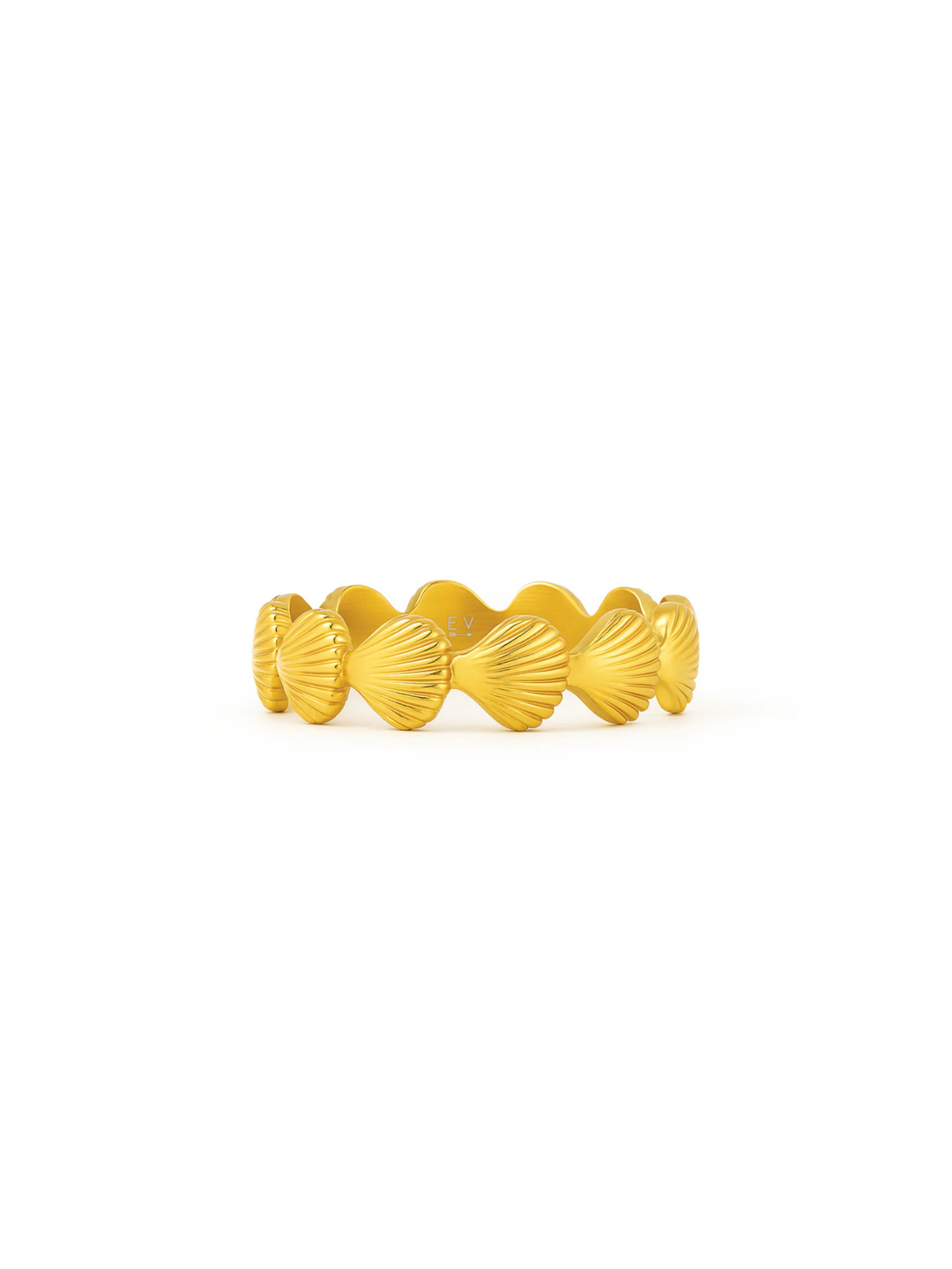 Gold ring with shell design on a white background