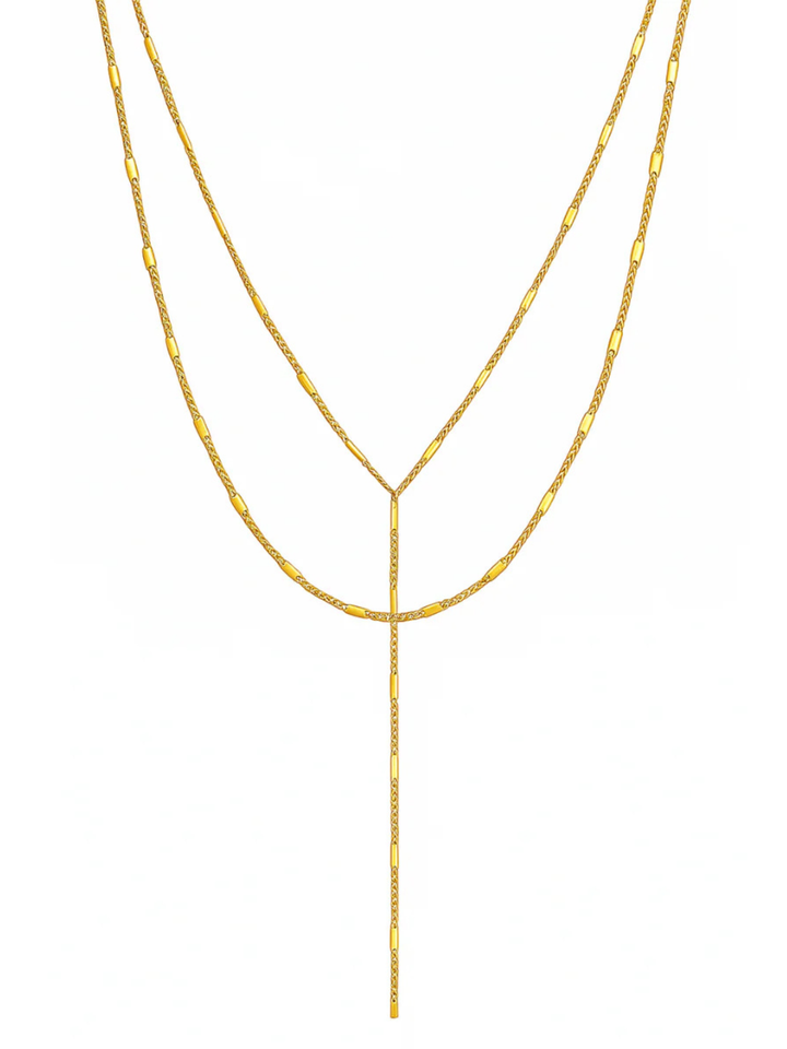 Gold necklace on a white background