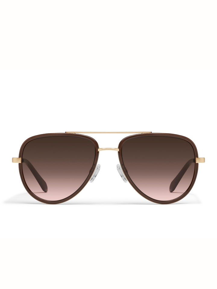A pair of aviator sunglasses with a brown gradient lens, gold metal frame, and gold double bridge, shown against a plain white background.