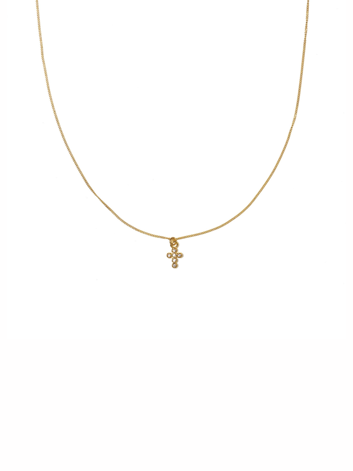 A delicate gold chain necklace with a small cross pendant adorned with tiny clear stones, displayed against a solid white background.