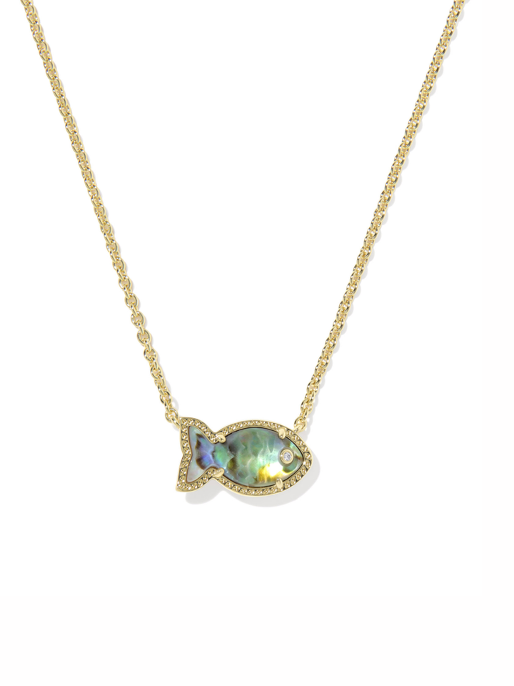 A gold chain necklace with a fish-shaped pendant featuring an iridescent green-blue mother-of-pearl center and small clear stones, shown on a plain white background.