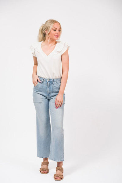 cream ruffle top