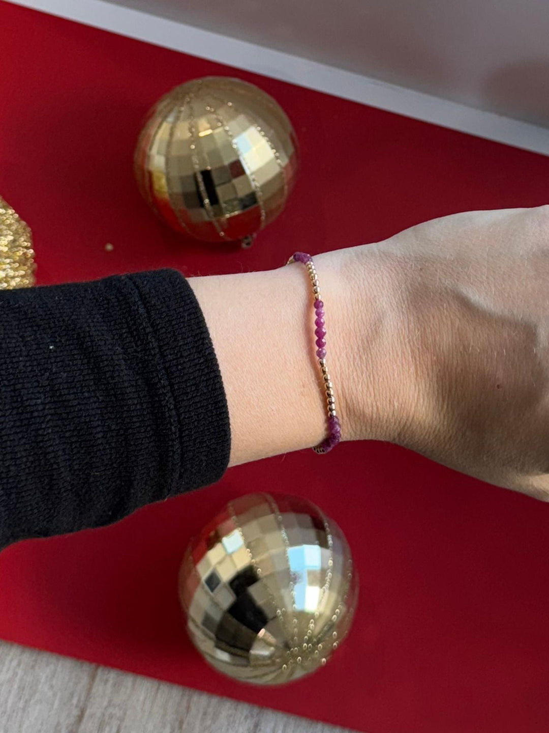 purple and gold bracelet