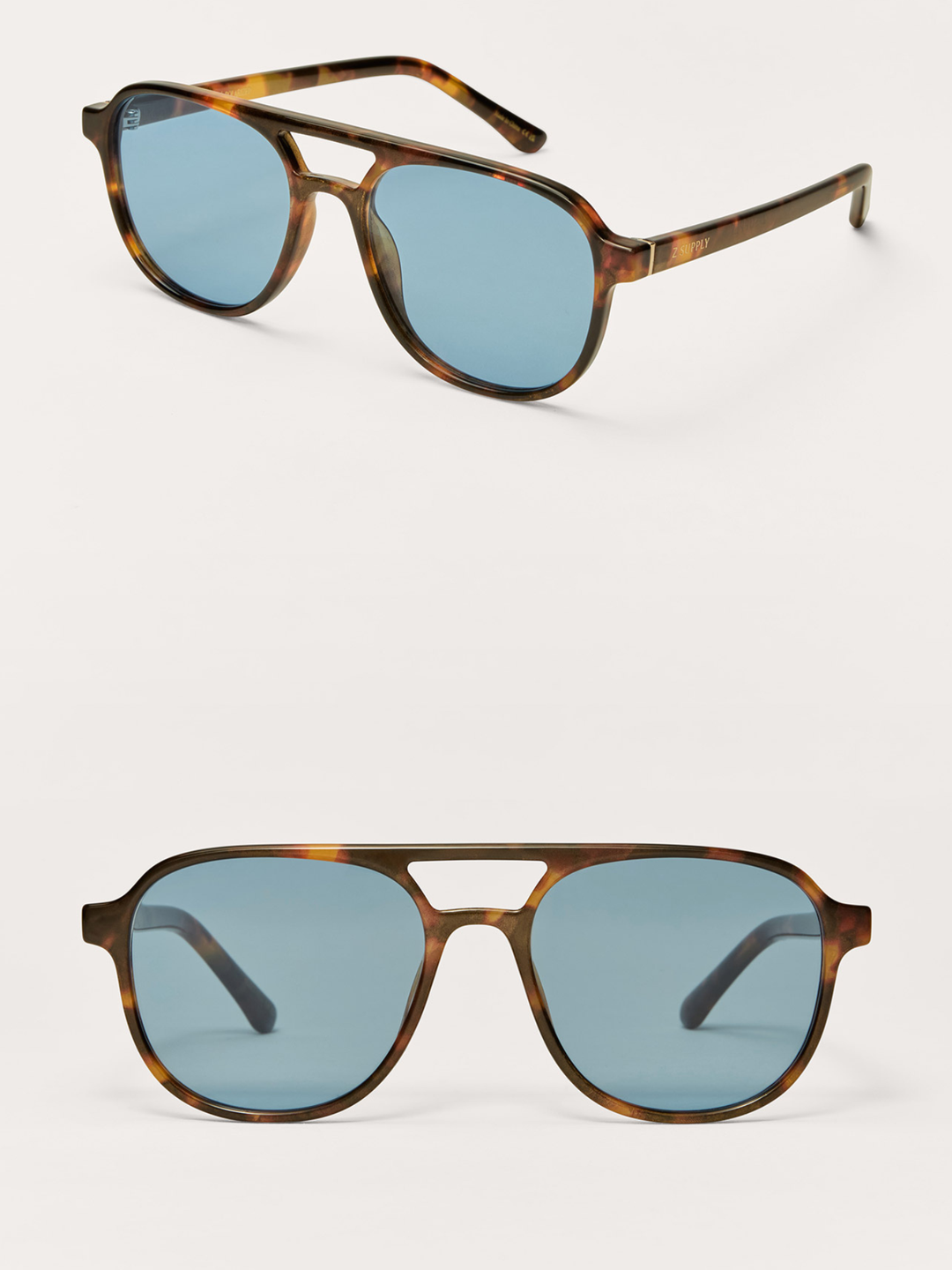 Two pairs of sunglasses shown on a clean white background, one from a top-down angle and one from a front angle. The sunglasses feature a classic double-bridge aviator-style frame in a brown tortoiseshell pattern with light blue lenses.