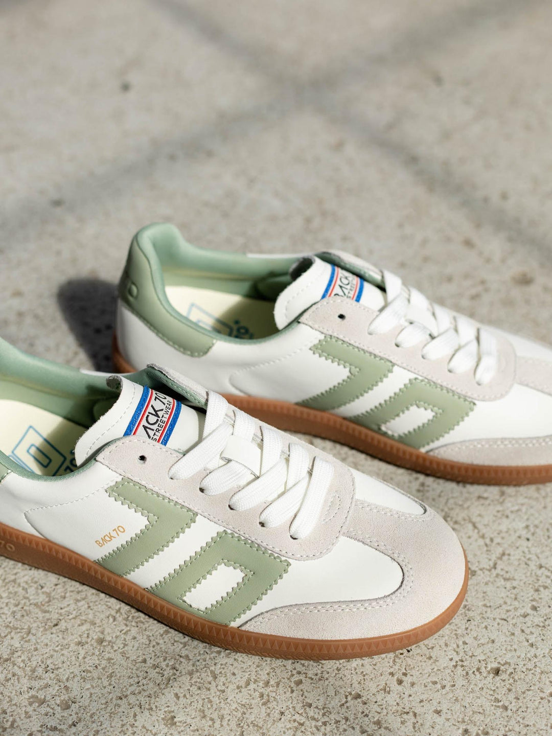green and white sporty sneaker