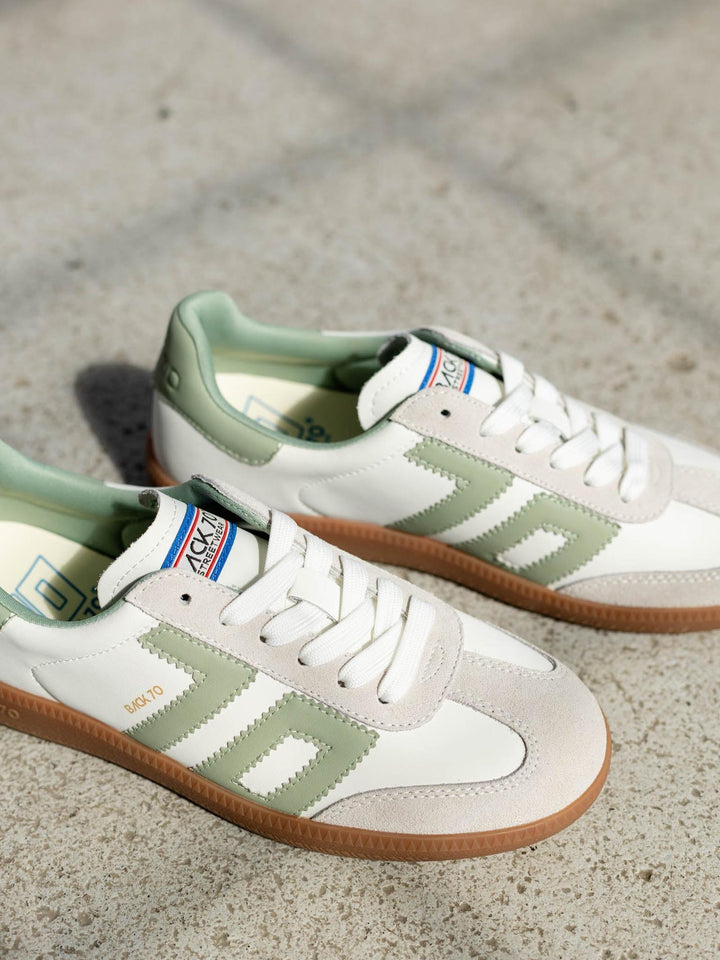 green and white sporty sneaker