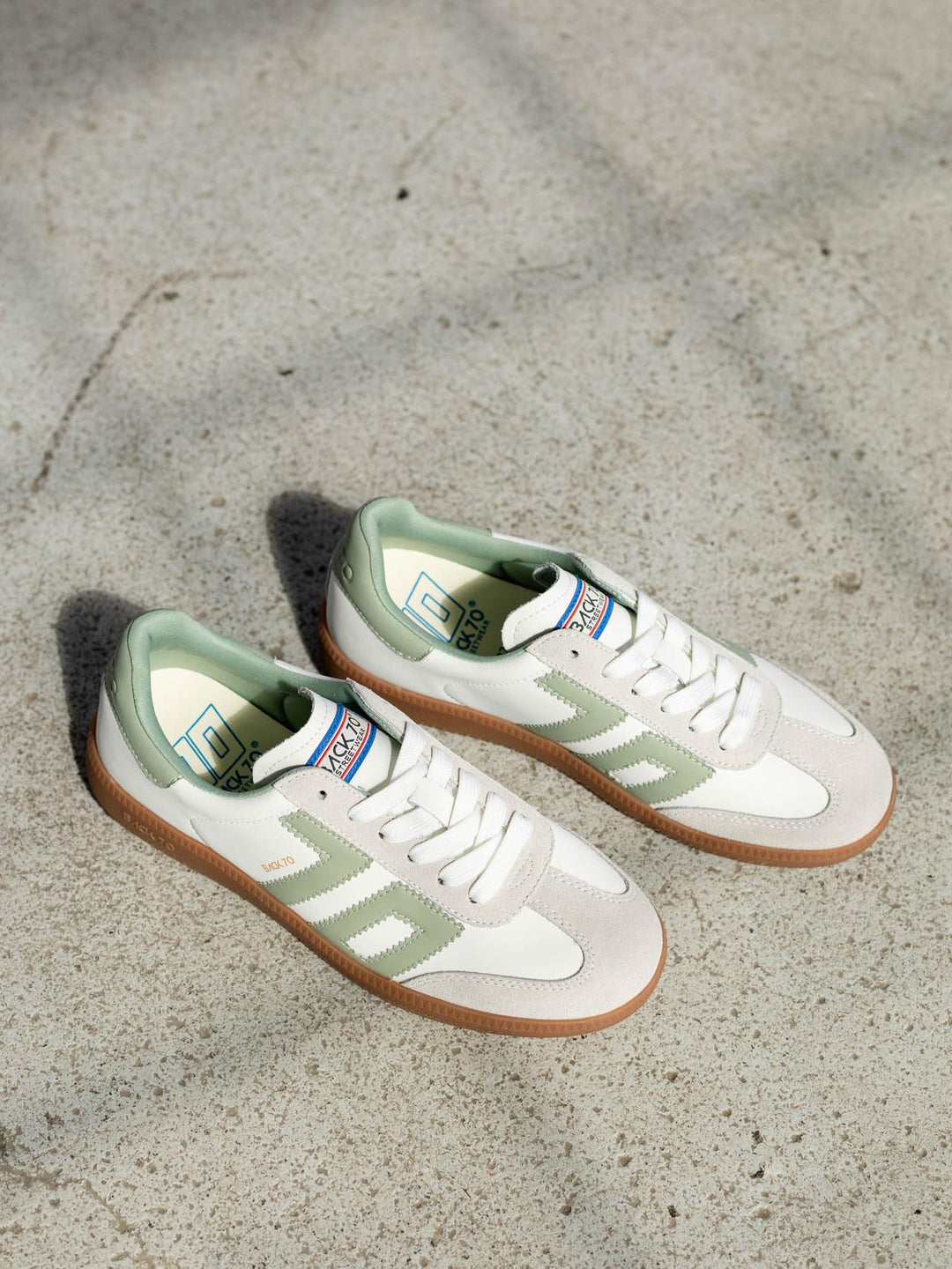 green and white sporty sneaker