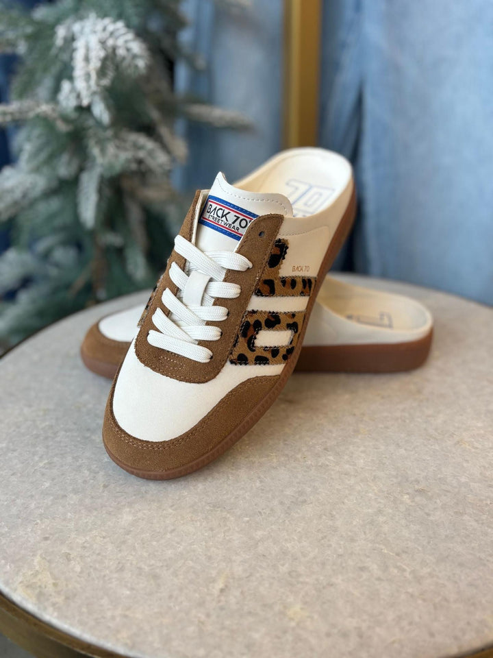 white and leopard printed sneaker