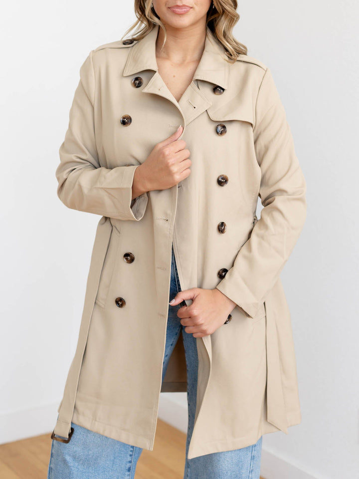 tan belted trench coat