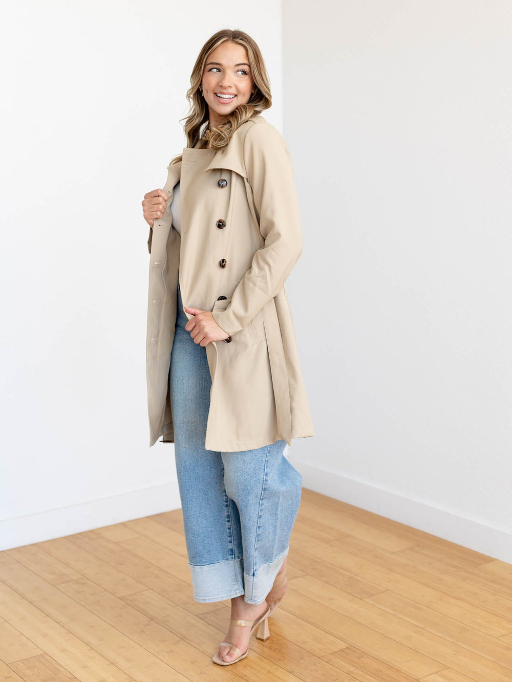 tan belted trench coat