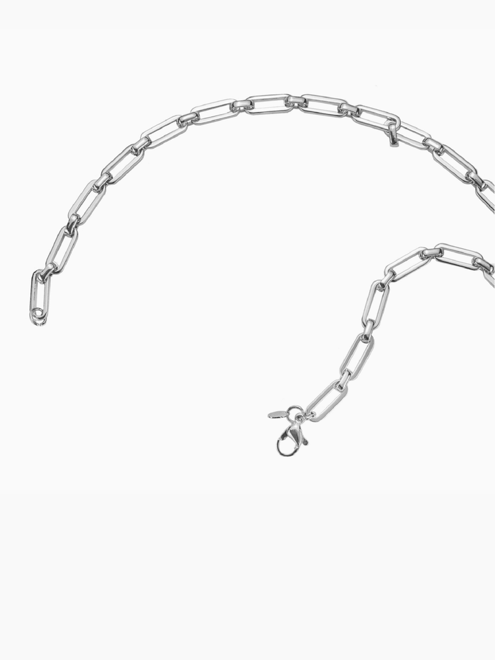 Silver chain necklace on a white background