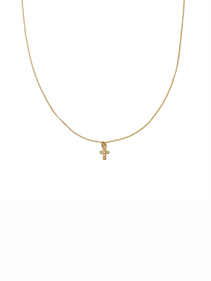 A delicate gold chain necklace with a small cross pendant adorned with tiny clear stones, displayed against a solid white background.