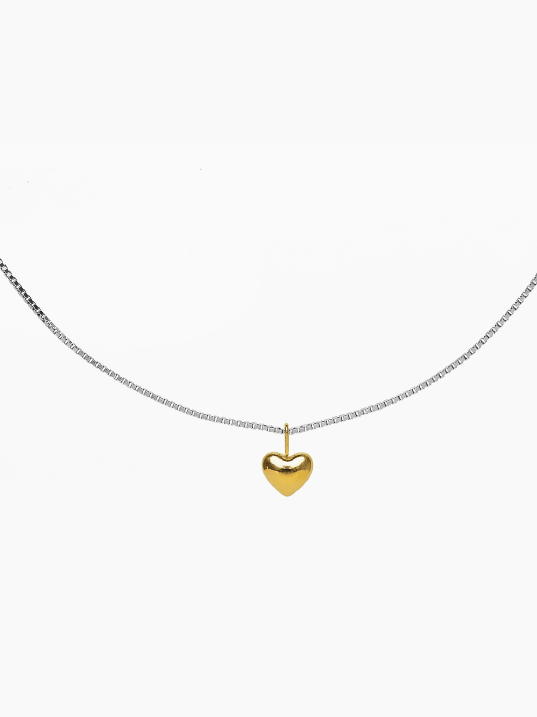 Necklace with a gold heart pendant on a white background