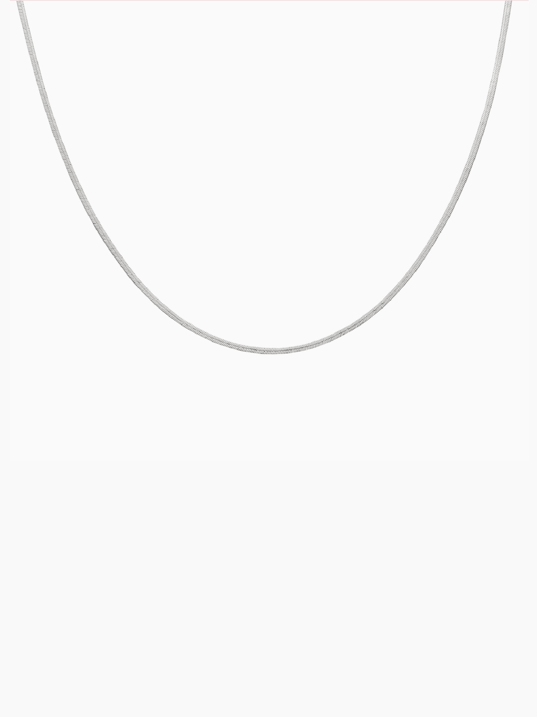 Silver chain necklace on a white background