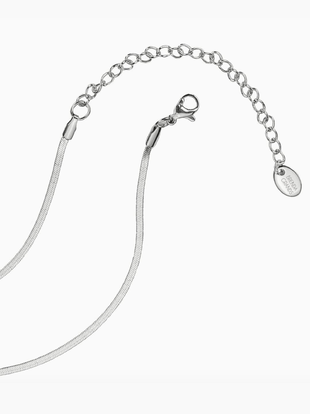 Silver chain necklace on a white background