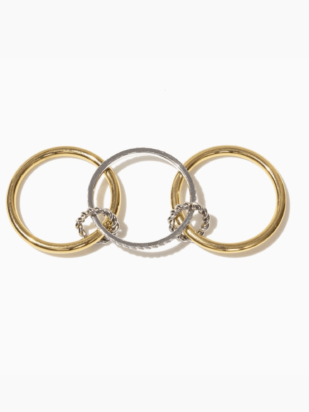 Three rings in gold, silver, and bronze on a white background
