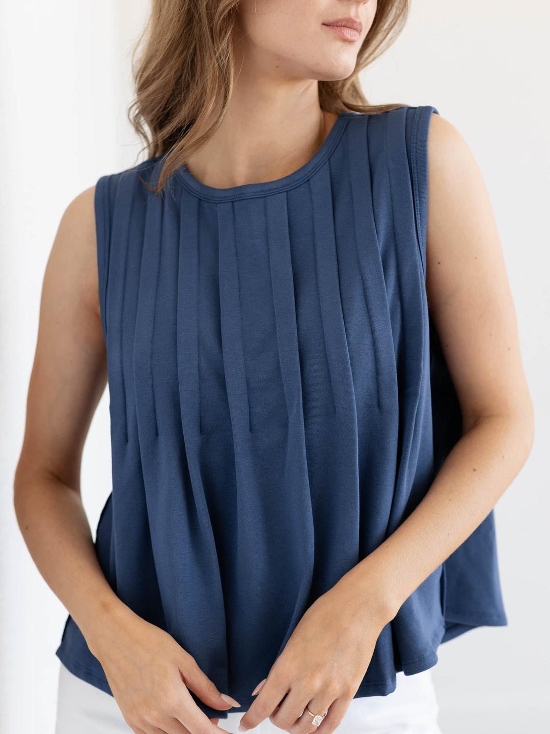 sleeveless pleated top