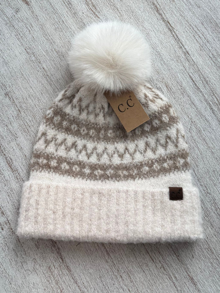 tan winter printed pom hat