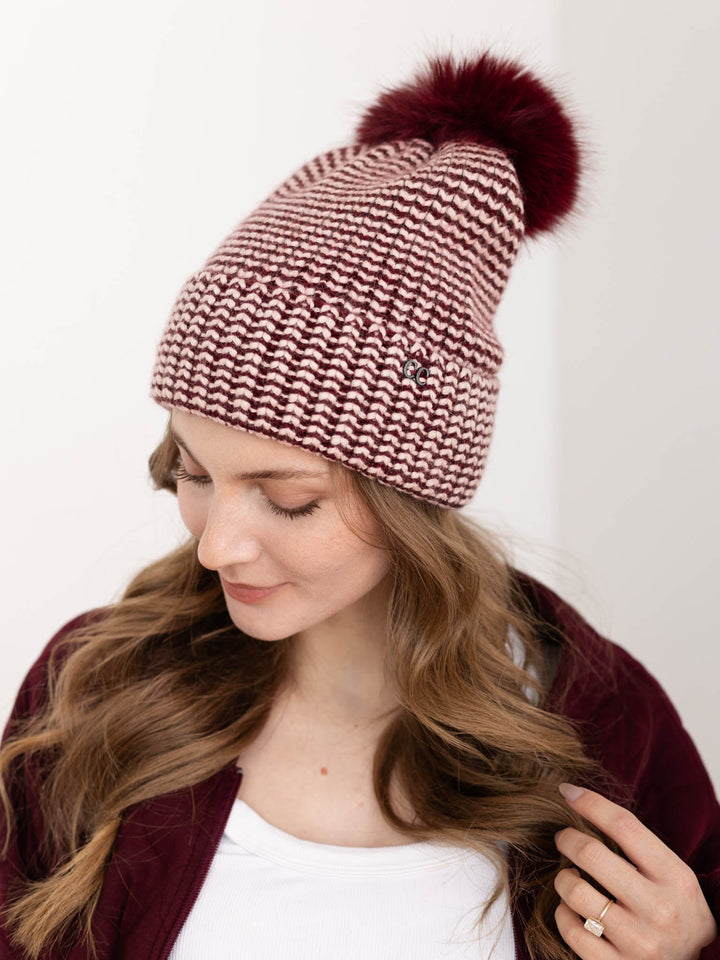 wine colored pom pom beanie
