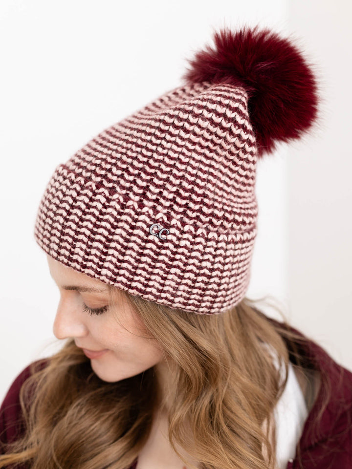 wine colored pom pom beanie