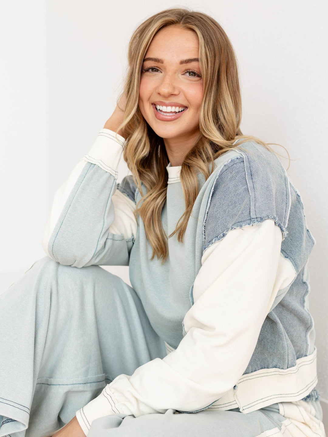 sage and denim stitched fleece top