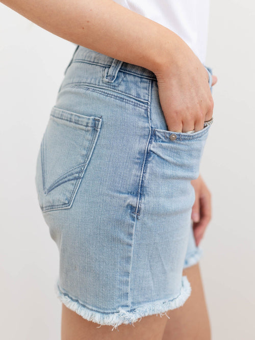 light wash frayed long inseam denim shorts