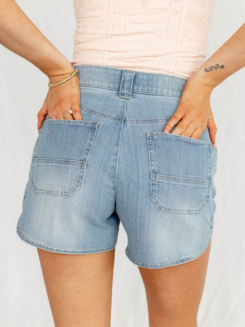 light wash long inseam dolphin hem shorts
