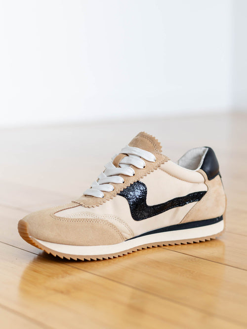 neutral tan and black retro sneaker