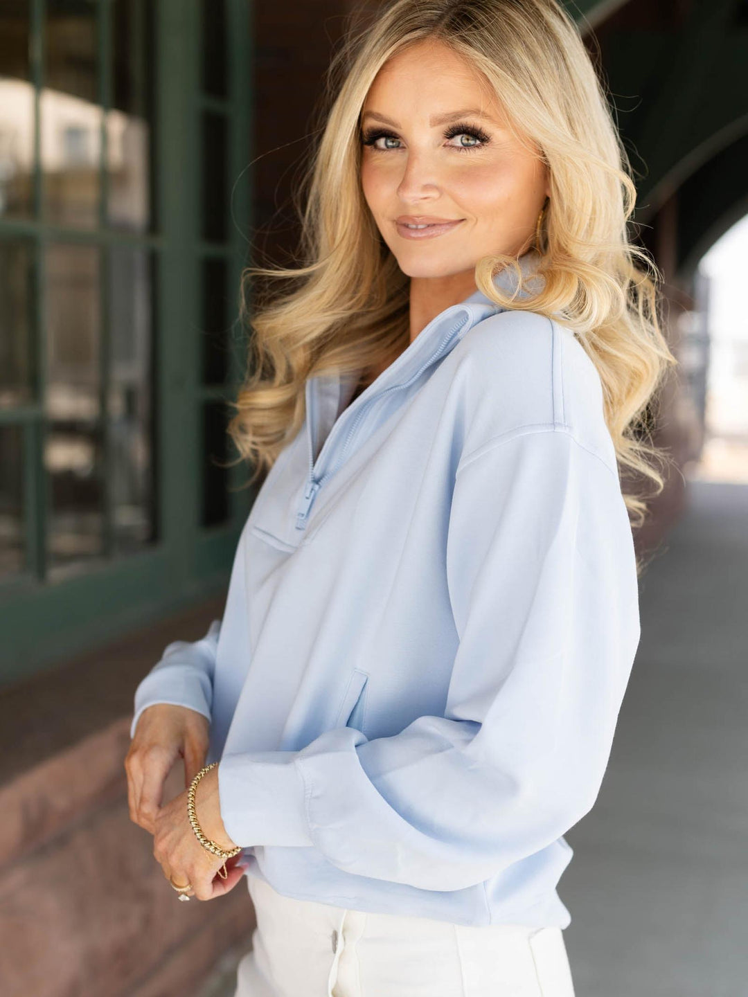 light blue quarter zip sweatshirt