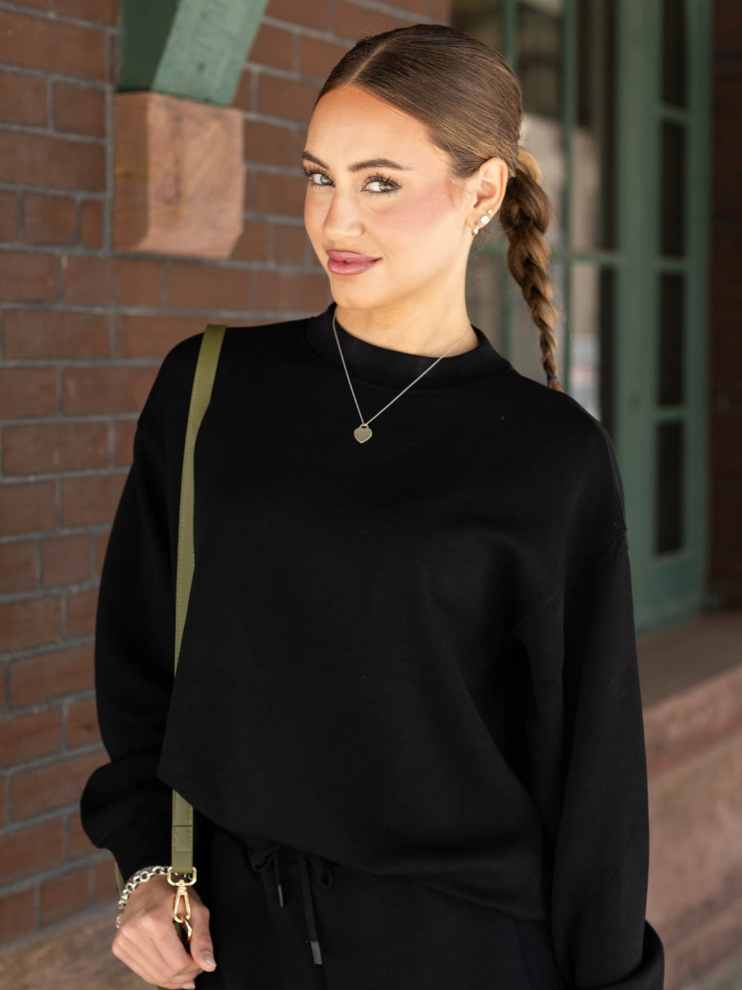 black mock neck sweatshirt