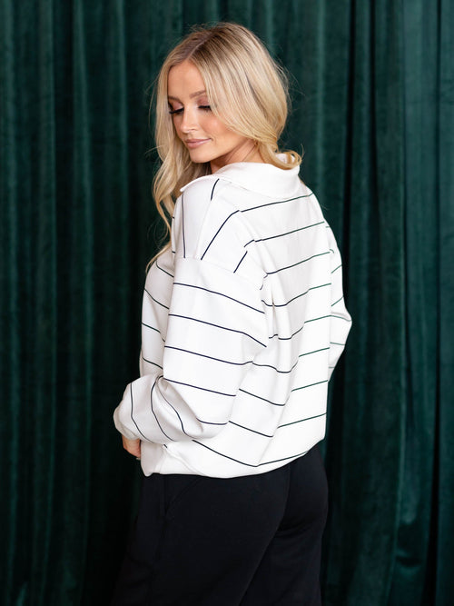 white and black polo top