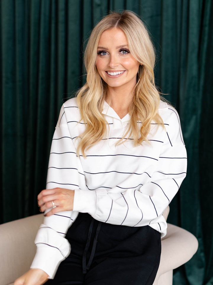 white and black polo top