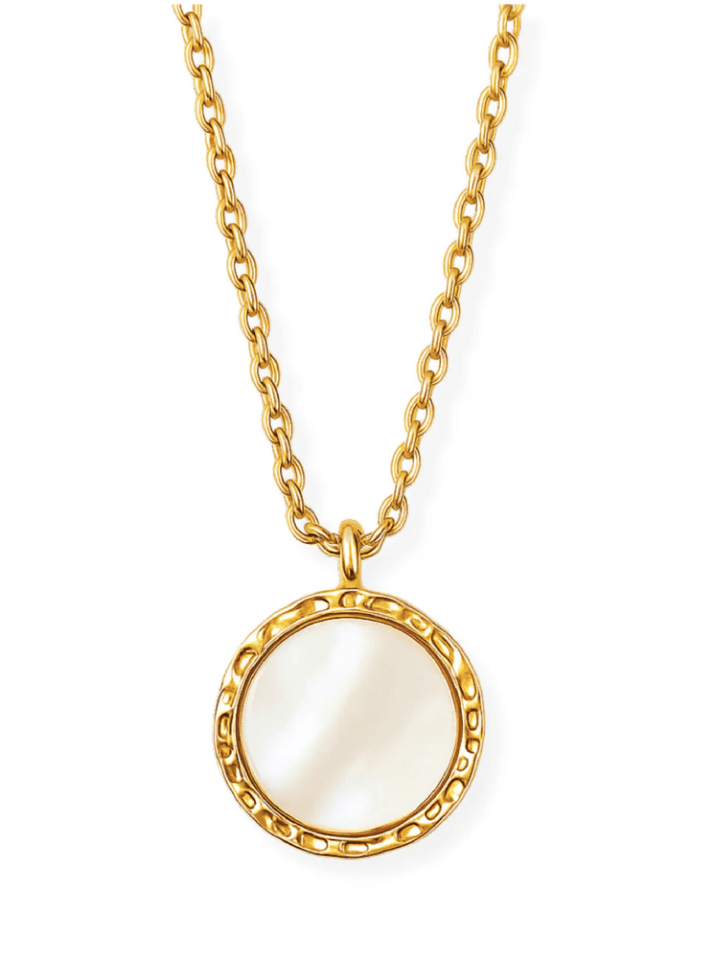Gold necklace with a round pendant on a white background