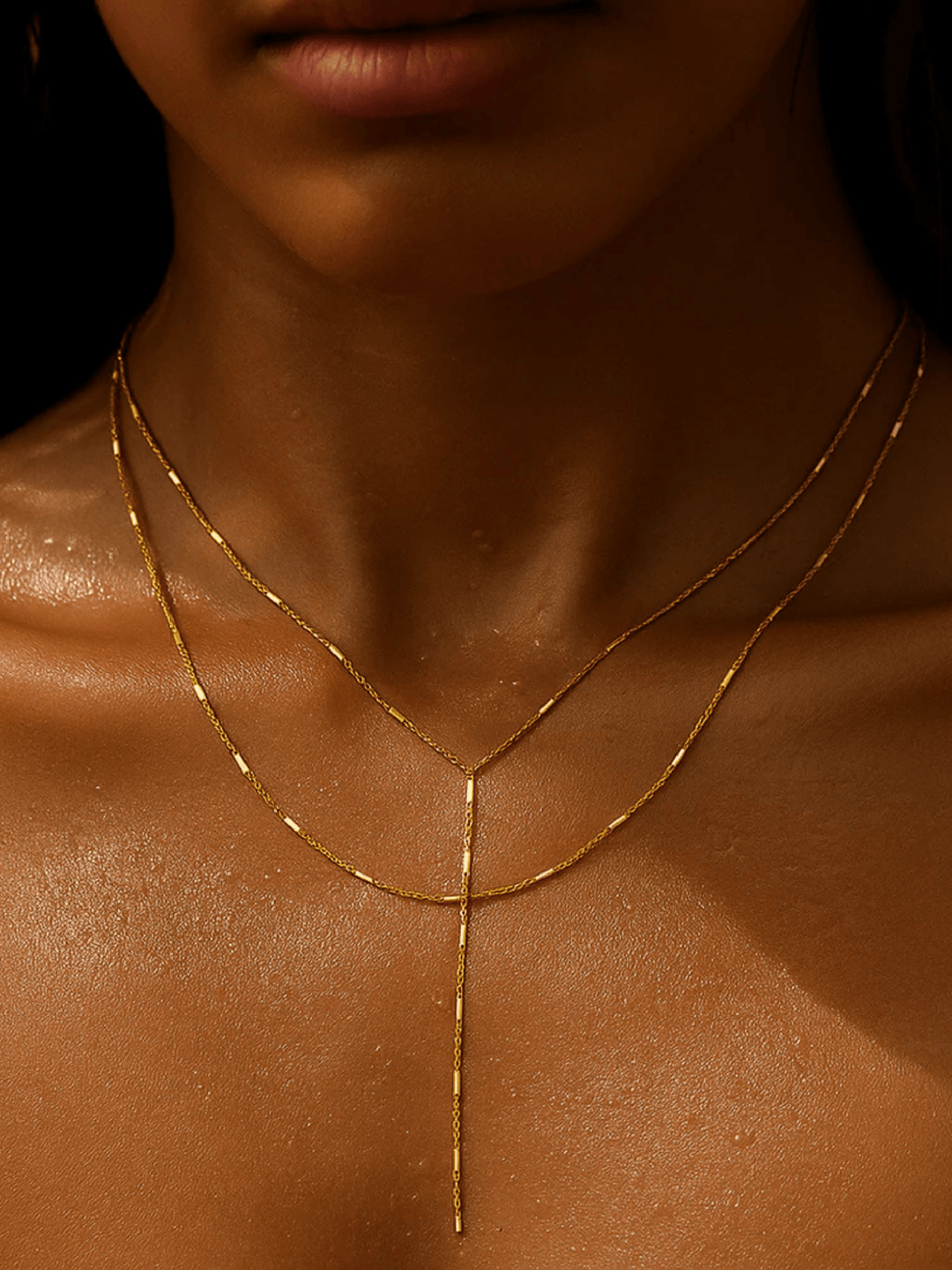 Gold necklace on a person&