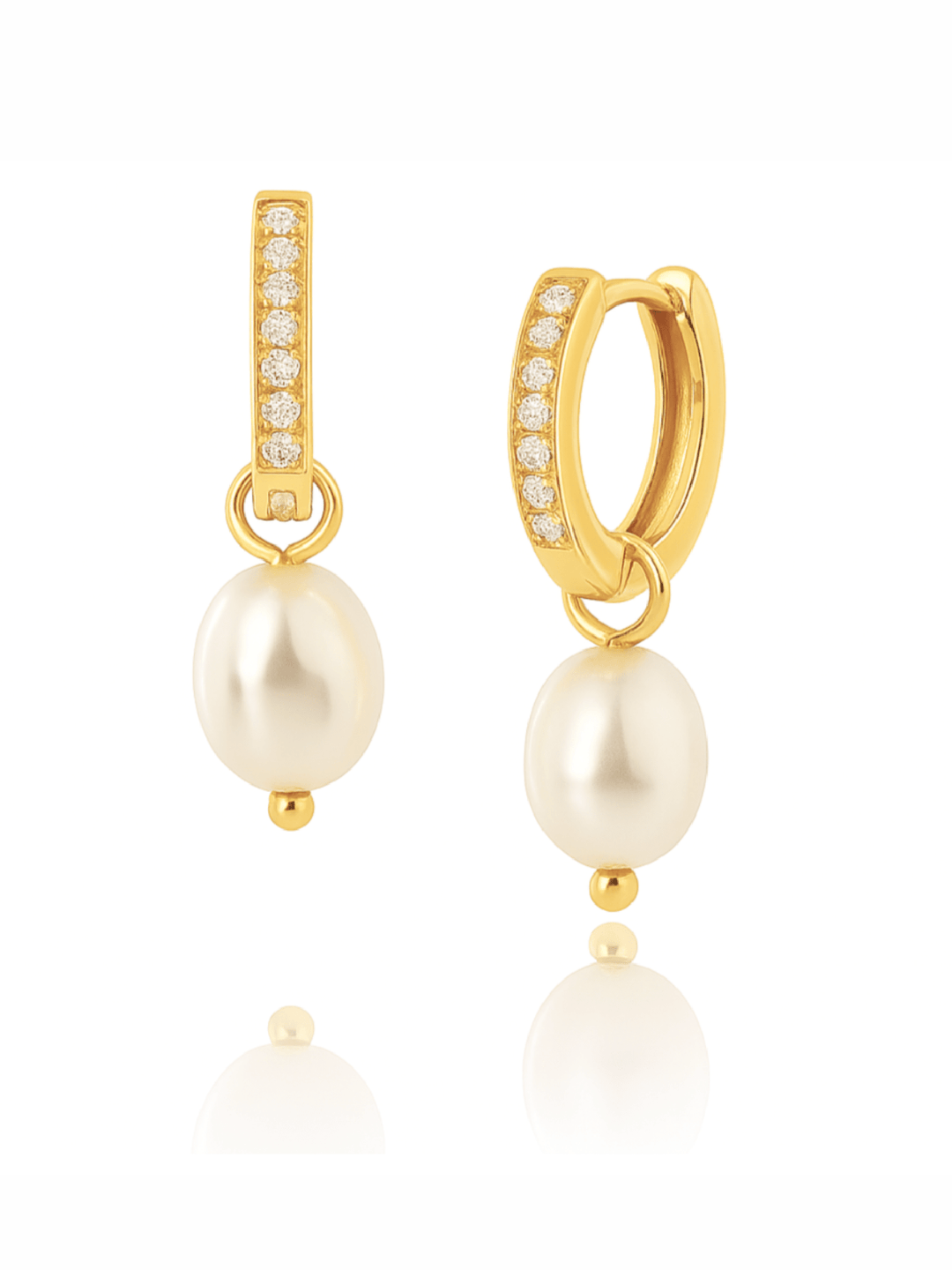 Gold hoop earrings with pearl drops on a white background
