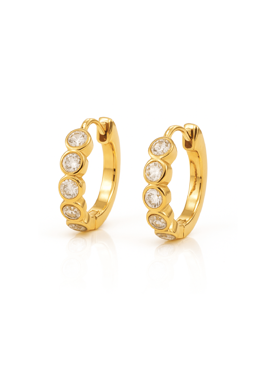 Gold hoop earrings with embedded stones on a white background