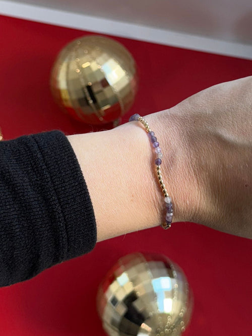purple and gold bracelet