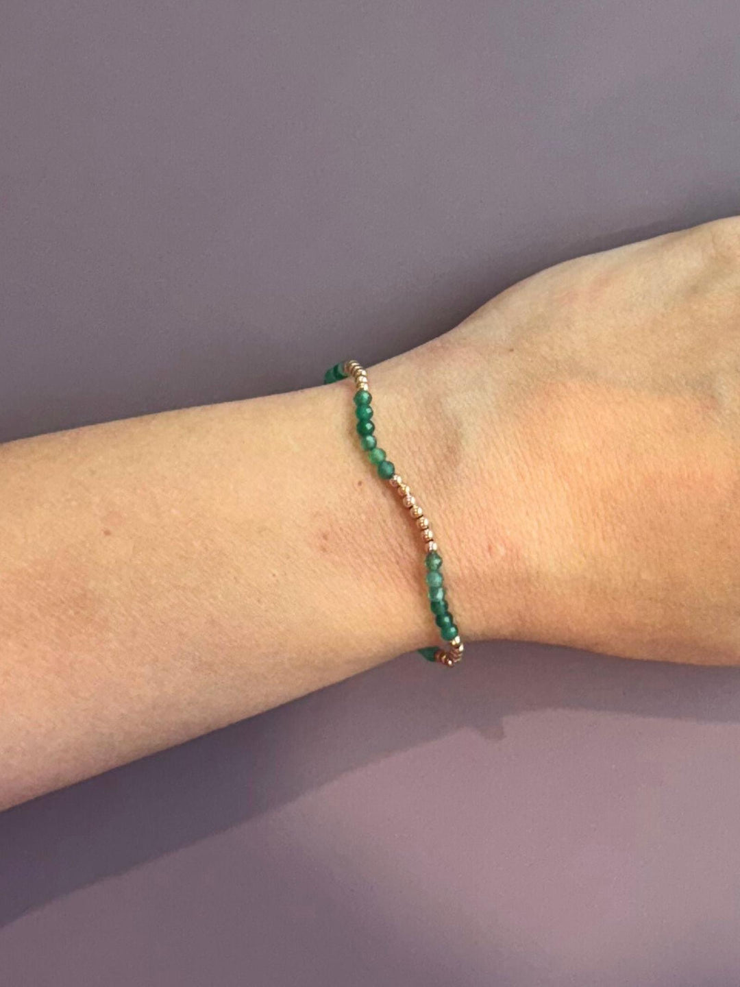 green and gold bracelet