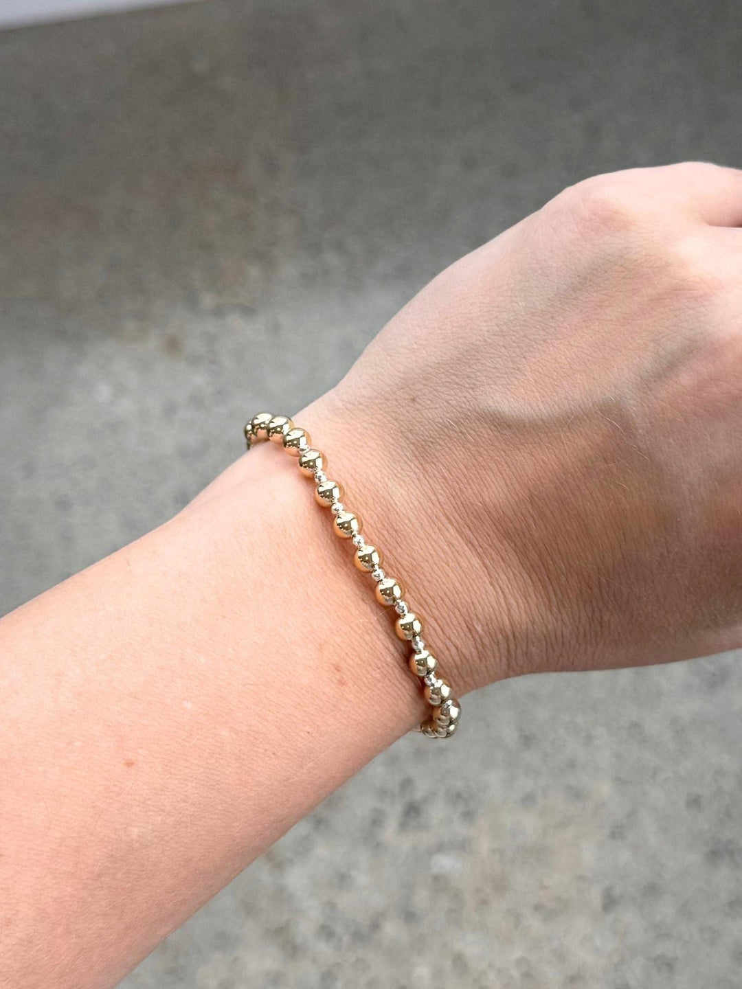 gold and silver bracelet