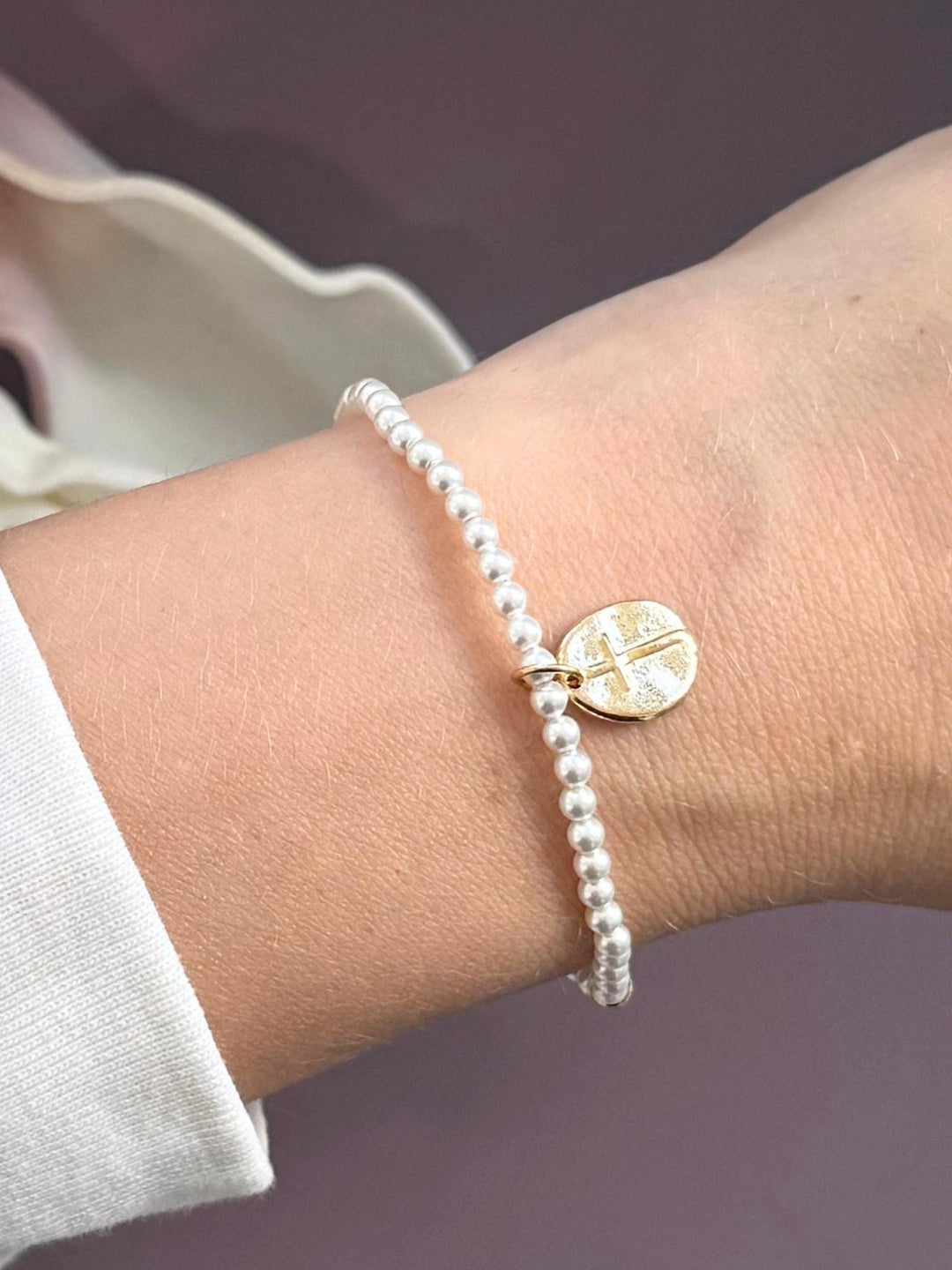 pearl cross bracelet