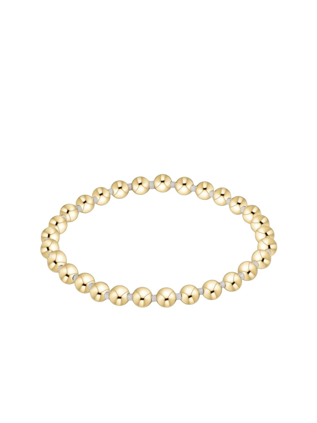 white and gold stretchy bracelet