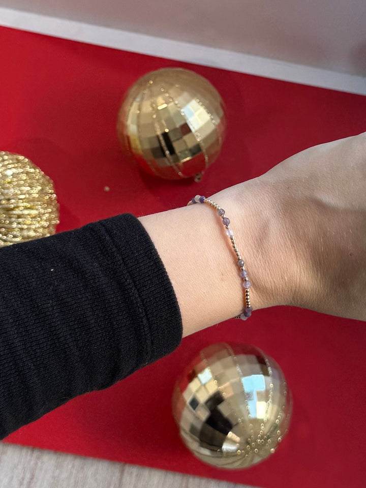 purple and gold bracelet
