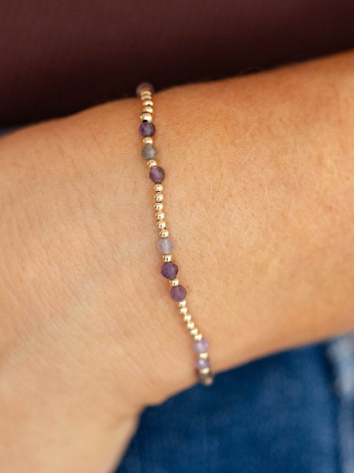 shades of purple and gold stretchy bracelet