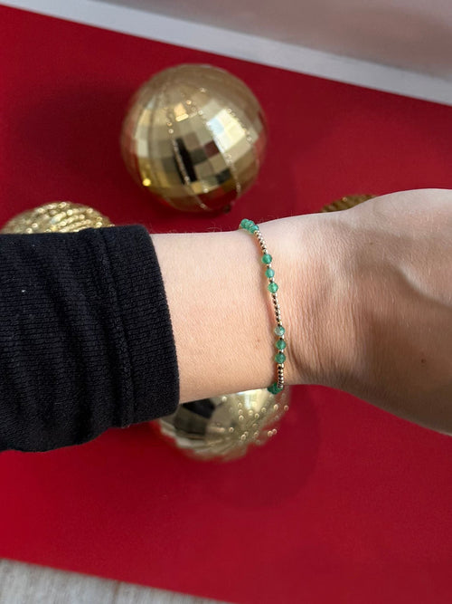 green and gold bracelet
