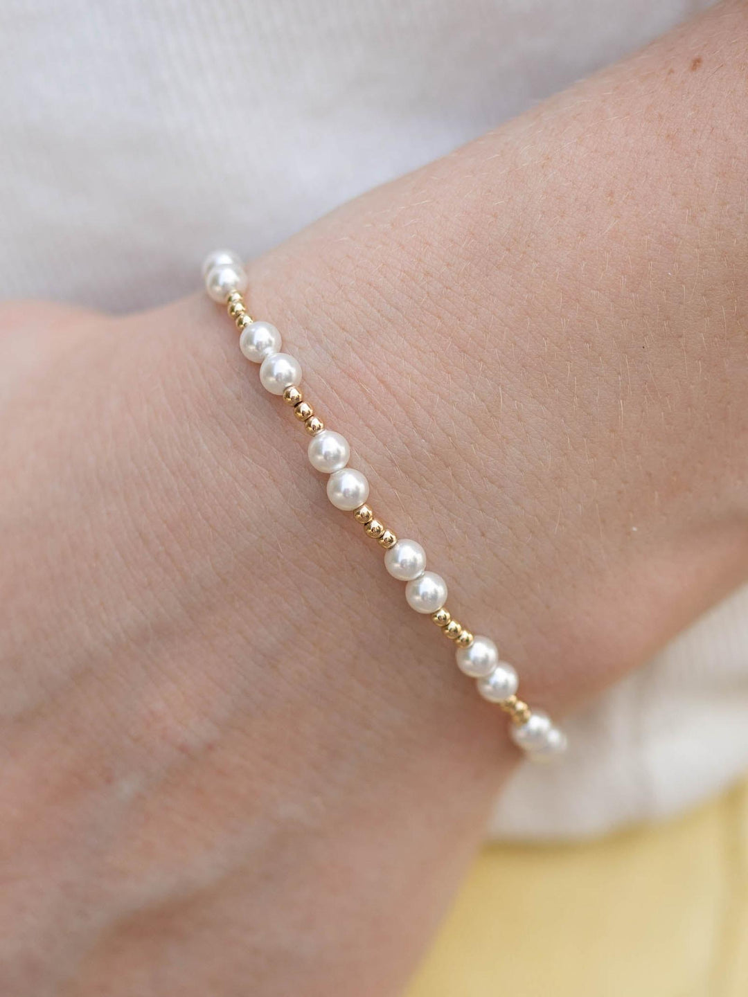 gold and pearl beaded bracelet
