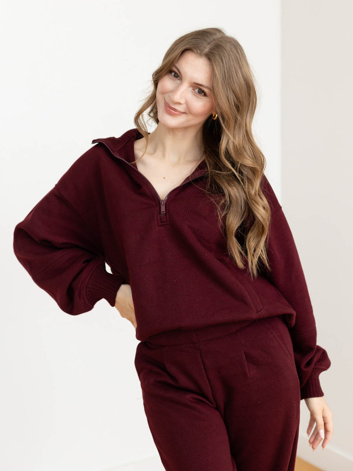 dark wine colored half zip sweatshirt