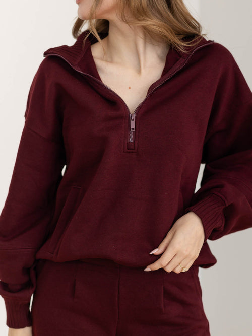 dark wine colored half zip sweatshirt